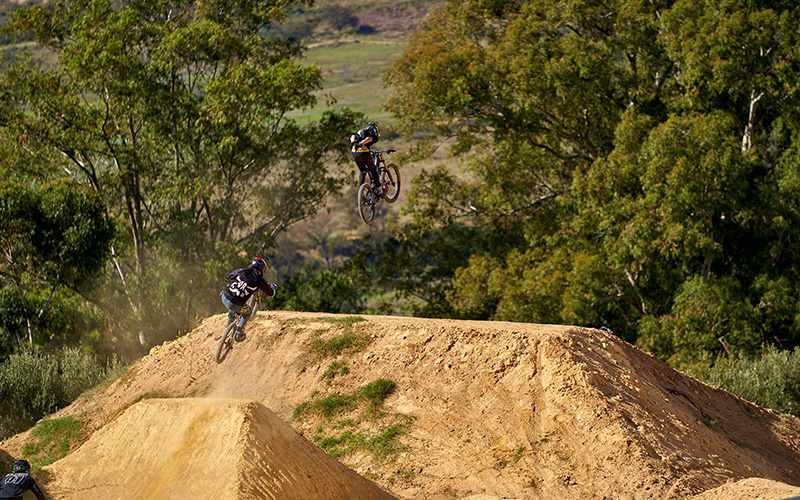 Building The World’s Biggest Bike Jumps With Bobcat Machines 