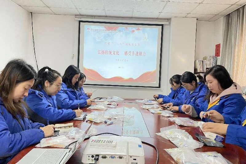 Shaanxi Construction Machinery: Party Branch of Construction Mechanization Launches Party Day Activities with the Theme of "Promoting Traditional Culture and Feeling the Charm of Non-Heritage" and "Celebrating March 8th"