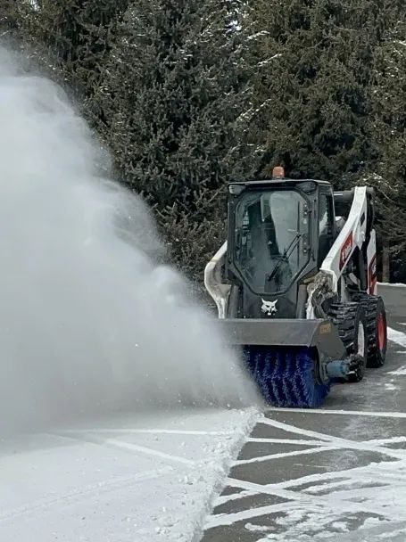 Bobcat: How to get rid of snow without snow-melting agent?